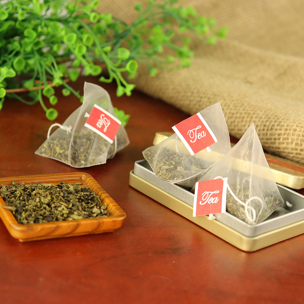 Fabricantes y proveedores de bolsitas de té vacías triangulares de PET de  China